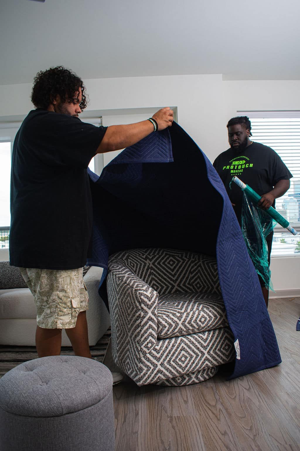 Labor-Only Services in Jacksonville. Employees wrapping up a couch. moving company in St. Augustine
