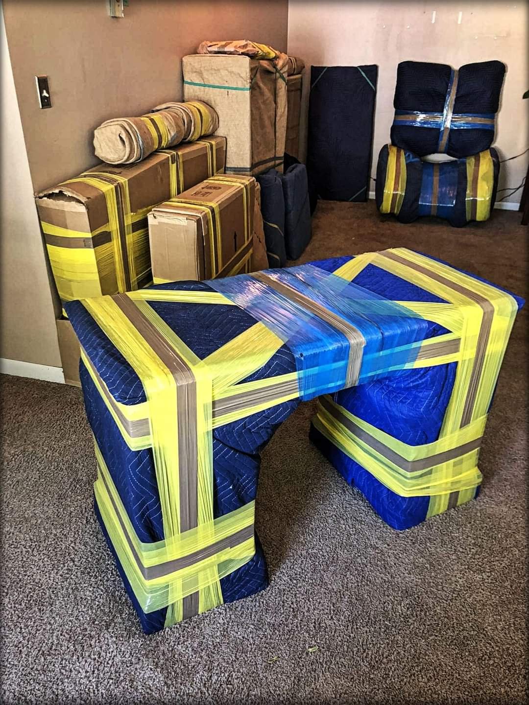 Antique moving services in Jacksonville. Desk wrapped and protected. moving company in Ponte Vedra