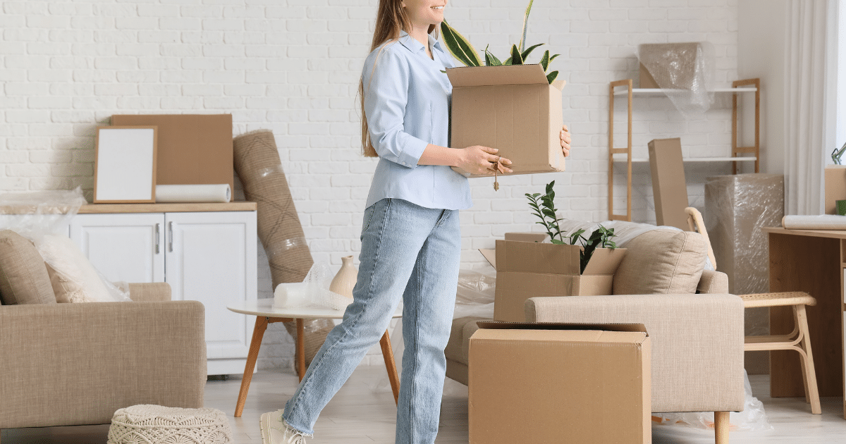 A woman organizing her home after a moving process