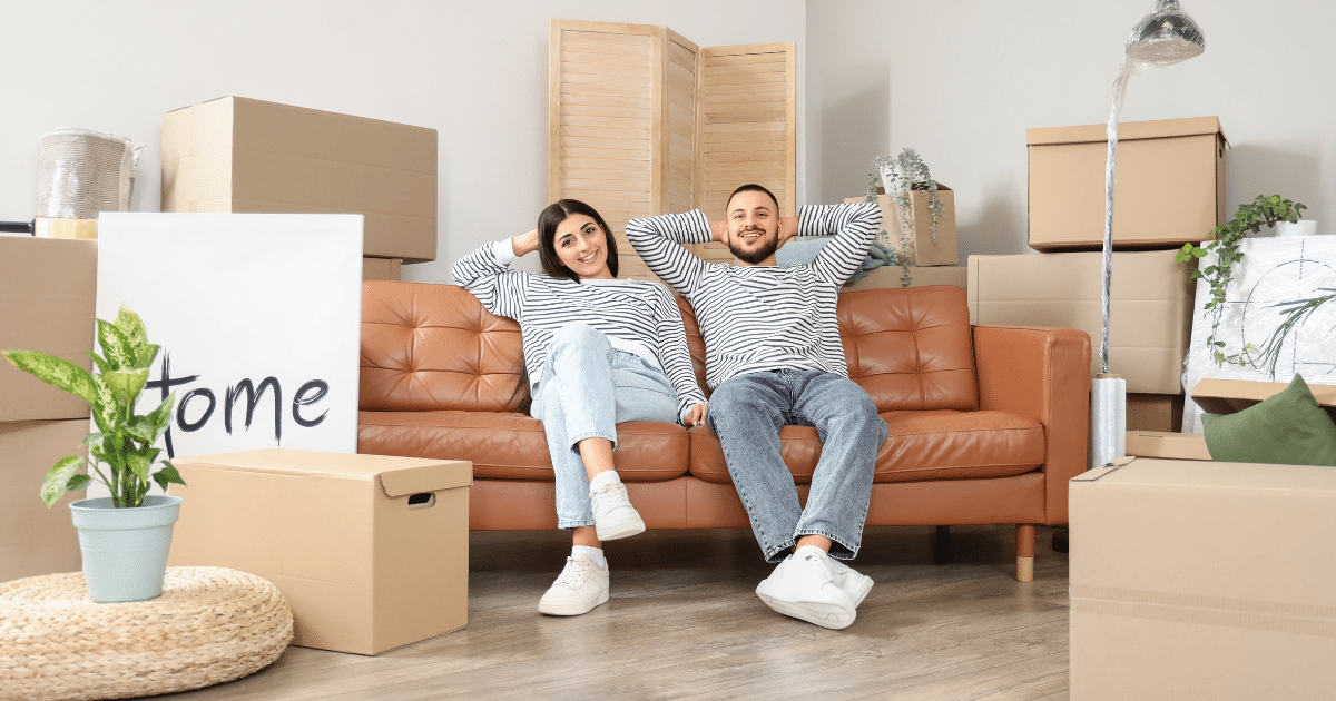 couple in their new apartment after a professional moving service