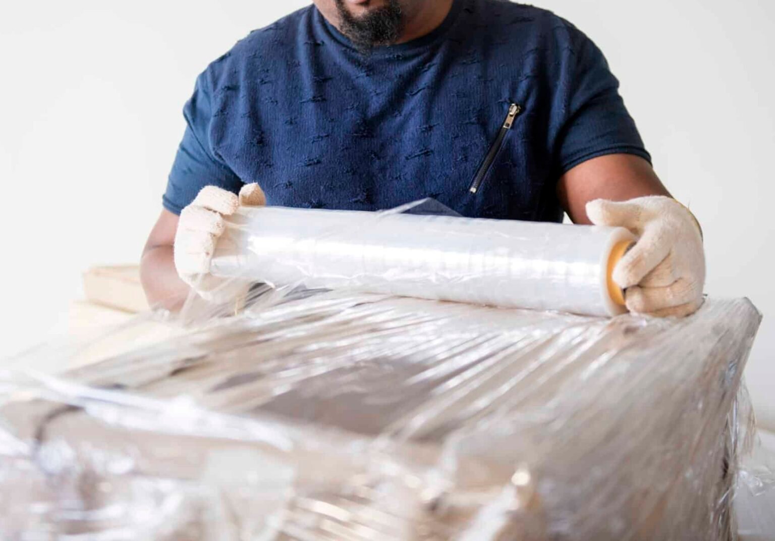 Moving expert preparing boxes to be loaded