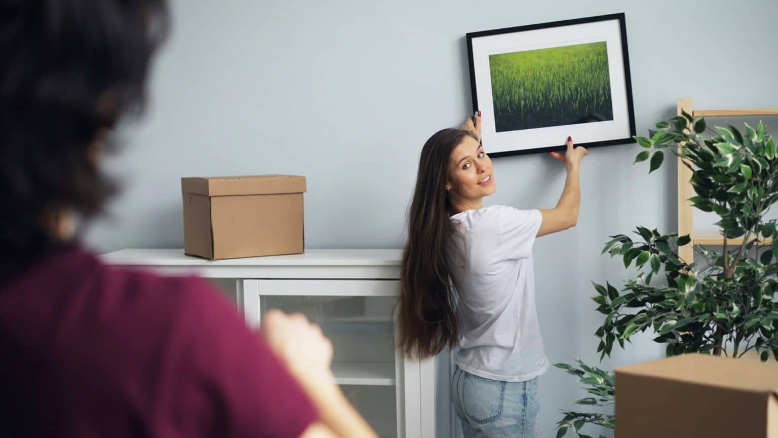 couple entering their new apartment after a professional moving service